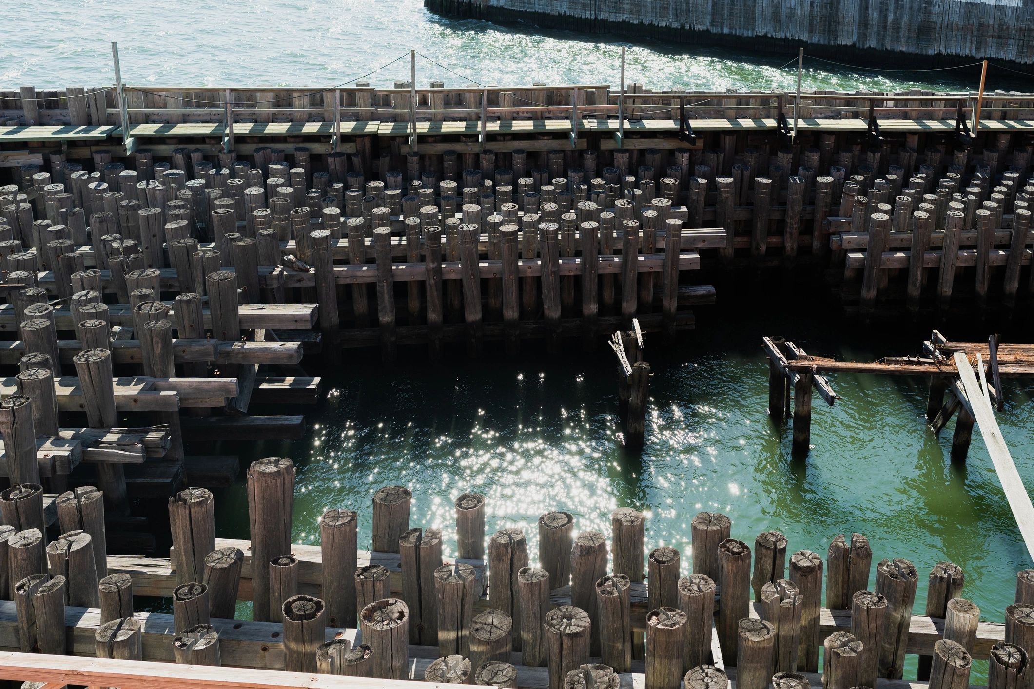 Waterfront dock and pilings representing a completed marine project